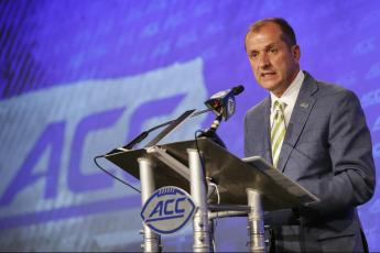 Atlantic Coast Conference commissioner Jim Phillips speaks during ACC Media Days on Wednesday in Charlotte, N.C. (NELL REDMOND/Associated Press)