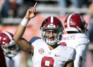 Alabama quarterback Bryce Young during warm ups before the start of a game against Auburn on Nov. 27, 2021, in Auburn, Ala. Alabama is No. 1 in the preseason AP Top 25 for the second straight season. (AP File)