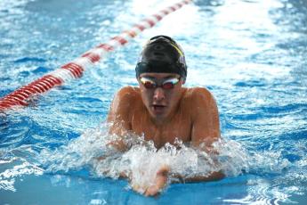Columbia swimmer Ian Disosway competes in the 100 breaststroke at the Region 1-3A meet on Oct. 26. (COURTESY)