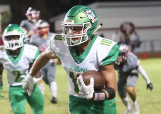 Suwannee receiver Kodi Lang runs up the field after a catch against Santa Fe last Friday. (PAUL BUCHANAN/Special the Reporter)