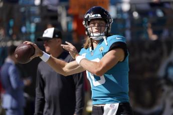 Jacksonville Jaguars quarterback Trevor Lawrence warms up before a game against the New York Giants on Oct. 23 in Jacksonville. (JOHN RAOUX/Associated Press)