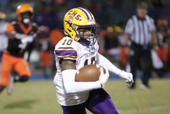 Columbia receiver Keeven Young races up the field after a catch against Orange Park last Friday. (BRENT KUYKENDALL/Lake City Reporter)