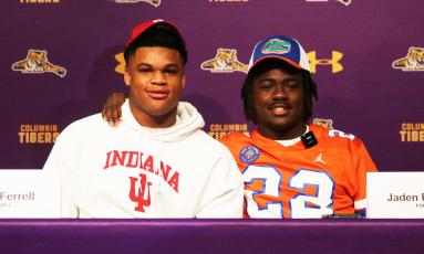 Columbia safety Amare Ferrell (left) signed his letter of intent with Indiana while linebacker Jaden Robinson (right) signed with Florida on Wednesday. (JORDAN KROEGER/Lake City Reporter)
