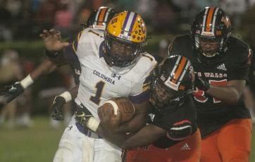 Columbia quarterback Tyler Jefferson takes a carry up the field against Lake Wales during Friday’s Class 3S state semifinal. (MICHAEL WILSON/Special to the Reporter)