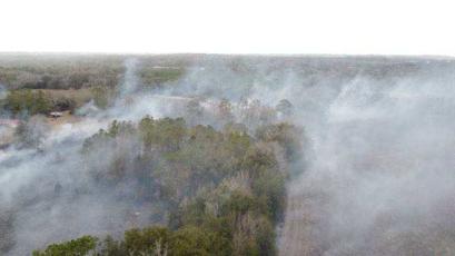 A brush fire spread across 44 acres southeast of Lake City on Thursday afternoon before it was contained. (COURTESY)
