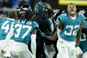 The Jacksonville Jaguars celebrate their game-winning field goal against the Los Angeles Chargers during Saturday's wild-card playoff game in Jacksonville. The Jaguars won 31-30. (JOHN RAOUX/Associated Press)