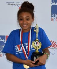 Lilianna Holman won the 8-9 age division at the Florida Elks Association Hoop Shoot state finals. (COURTESY)