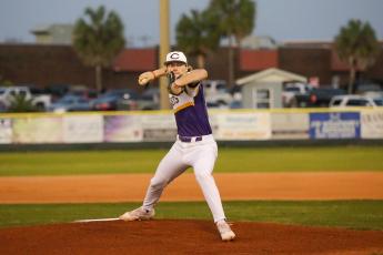 Columbia pitcher Josh Fernald pitches against Bartram Trail on Feb. 22. (BRENT KUYKENDALL/Lake City Reporter)