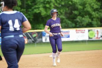 Columbia first baseman Kimber Long trots around the bases after hitting a two-run home run against P.K. Yonge on Tuesday night. (BRENT KUYKENDALL/Lake City Reporter)