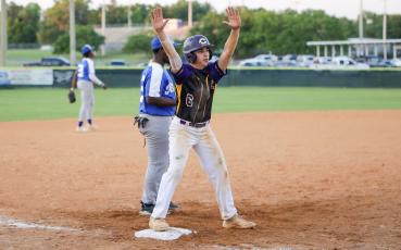 Columbia second baseman Grant Bowers called for timeout at third base after hitting a 2-RBI triple against Rickards in the District 2-5A semifinals on Tuesday night. (BRENT KUYKENDALL/Lake City Reporter)