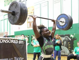 Suwannee’s Marquavious Owens completes the clean and jerk during the District 5-1A meet on March 31. (PAUL BUCHANAN/Special to the Reporter)