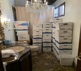 This image, contained in the indictment against former President Donald Trump, shows boxes of records stored in a bathroom and shower in the Lake Room at Trump's Mar-a-Lago estate in Palm Beach. Trump is facing 37 felony charges related to the mishandling of classified documents according to an indictment unsealed Friday. (Justice Department via AP)