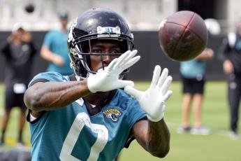 Jacksonville Jaguars wide receiver Calvin Ridley catches a pass during Monday's practice in Jacksonville. (JOHN RAOUX/Associated Press)