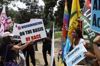 Protesters for and against affirmative active demonstrate on Capitol Hill on Thursday in Washington, D.C. (ANNA MONEYMAKER/Getty Images/TNS)