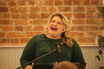 U.S. Rep. Kat Cammack (R-Gainesville) laughs during her update at the Lake City-Columbia County Chamber of Commerce’s Legislative Breakfast on Tuesday at The Blanche Hotel. (JAMIE WACHTER/Lake City Reporter)
