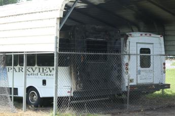 Parkview Baptist Church’s two buses were damaged in a fire Wednesday night. (JAMIE WACHTER/Lake City Reporter)