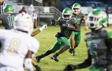 Suwannee running back Marquavious Owens makes a move in the open field against North Marion on Friday. (JAMIE WACHTER/Lake City Reporter)