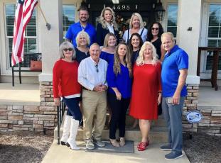 Staff at Brannon Real Estate will help host the annual veterans dinner on Nov. 11 at the Columbia Gateway Fairgrounds. Pictured here are Gail March-Baker (bottom row, from left), Jack Russell, Elicia Linton, Teresa Brannon, and Duke Silvey; Bonice Phinney (second row, from left), Callie Harrington, and Mindy Tenneboe; Michael Morrison (third row, from left), Leila Harrington and Tammy Tyre. Not pictured: Christian Griffis, Pamela Nettles, Amy Overstreet and Michale Cuadras. (COURTESY)