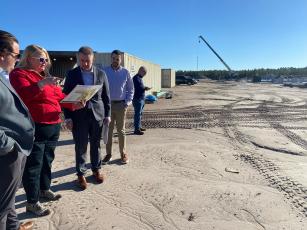 Columbia County Economic Development Director Jennifer Daniels discusses plans for the North Florida Mega Industrial Park with FloridaCommerce officials on a recent visit. (COURTESY)
