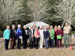 Lake City Garden Club members Kathy Smith (from left), Bonnie Taylor, Martha Ann Ronsonet, Jan Wheeler, Carol Stevens, Dorothy Colvin, Nora Riley, Arline Craft, Sandra Foreman, Carole Robertson, Carole Brown, Diane Feagle, Julie Schwartz and President Cheryl Libbert attended a 100th Arbor Day anniversary celebration Friday with Columbia County Forester Pierce Tolar at the Suwannee Valley Care Center. (COURTESY)