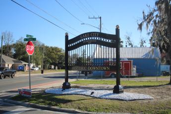 The historic downtown Lake City gate was recently re-erected at the intersection of North Marion Avenue and NW Fronie Street. (TONY BRITT/Lake City Reporter)