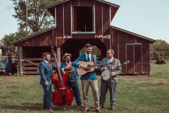 The Flattlanders, which includes Lake City’s Brian Andrews (second from right), Matt Melton (from left), Joey Lazio and Andy Kennan, placed fourth in the Society for the Preservation of Bluegrass Music in America national band competition this past weekend in Nashville. (COURTESY)