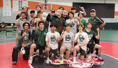 Suwannee celebrates after winning the District 2-1A duals on Friday. (COURTESY)