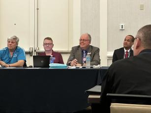 Columbia County Emergency Management Director Shayne Morgan (second from right) listens during a panel discussion at the 2024 Florida Emergency Preparedness Association conference. (COURTESY)