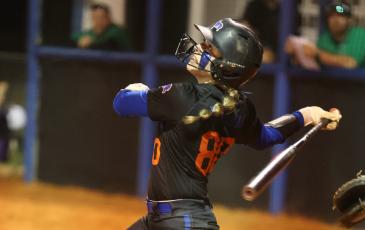 Branford catcher Morgan Brennan watches a hit ball against Suwannee on March 5. (PAUL BUCHANAN/Special to the Reporter)