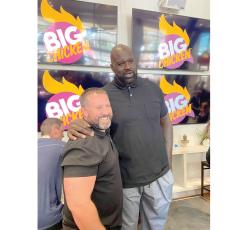 Chris McMillan, the CEO of the Panhandle Restaurant Group that is opening a Big Chicken restaurant in Lake City, is pictured with Big Chicken founder Shaquille O’Neal. (COURTESY)