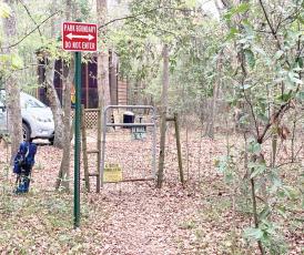 A gate into Rum Island Park from a neighboring property that stands in place of a county fence, which Columbia County officials say was cut to provide free access into the park. (COURTESY)