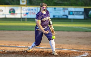 Columbia pitcher Josie Raulerson pitches against Buchholz on April 4. (BRENT KUYKENDALL/Lake City Reporter)