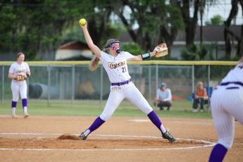 Columbia pitcher Harleigh Price winds up to pitch against Trenton on Tuesday night. (BRENT KUYKENDALL/Lake City Reporter)