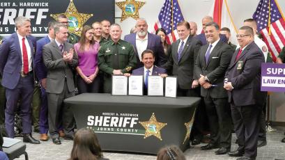 Gov. Ron DeSantis signed a pair of bills Friday, including one that would limit the scope of police review boards, during a ceremony at the St. Johns County Sheriff’s Office in St. Augustine. (COURTESY)