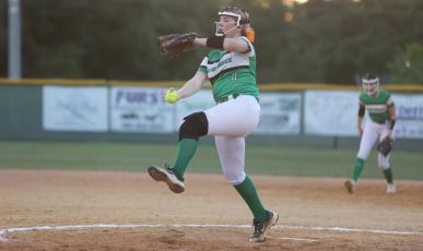 Suwannee pitcher Gracie Watley winds up to pitch against Gainesville on April 12. (PAUL BUCHANAN/Special to the Reporter)