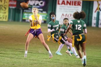 Columbia receiver Mia Brasel makes a catch against Suwannee on March 12. (PAUL BUCHANAN/Special to the Reporter)