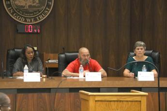 Live Oak Council candidates Vanessa Brown Robinson (from left), Jeff Chaillou and Gladys Owens answer questions from the dais during Monday’s candidate forum hosted by the Suwannee County Voters League. (MORGAN MCMULLEN/Lake City Reporter)