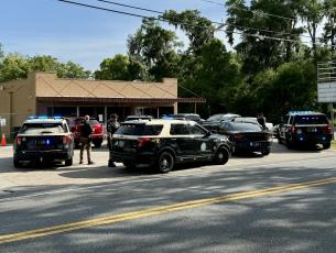State agents shut down two illegal gambling houses in White Springs, including the Social Center, on Wednesday after executing search warrants. Five people were arrested. (COURTESY)