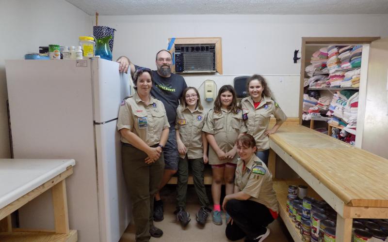 Stephanie Chambers-Wolff, scout master for Troop 9085G; Jayson Wolff, a parental volunteer; Marion Wolff; Harmony Parker; Skylar Beichner; and Erica Cummings pose after completing a makeover of the Lake City Humane Society’s food preparation area. (STEPHANIE CHAMBERS-WOLFF/Special to the Reporter)
