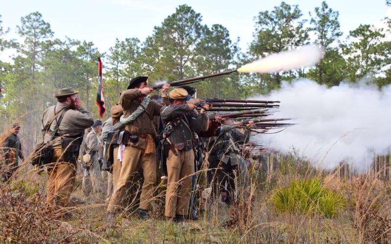 Confederate soldiers fire at Union troops during the 2018 Battle of Olustee Re-enactment on the site of the original 1864 battle. The re-enactment and Olustee Battle Festival, which is held in Lake City, are set for mid-February. (FILE)