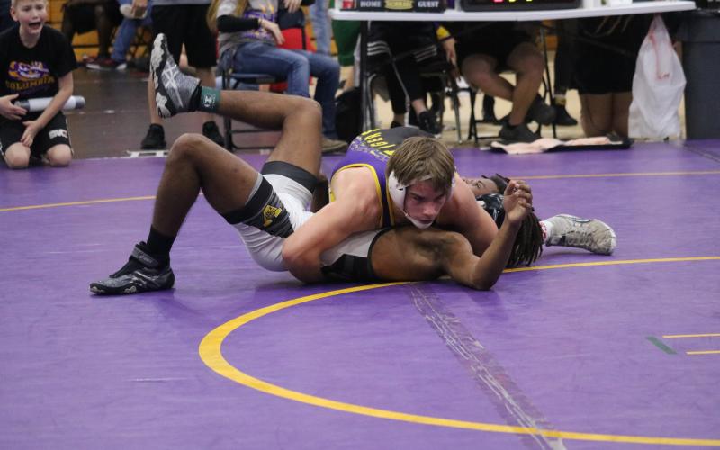 Ian McGuigan pins his opponent from Valdosta during the Tiger Duals on Saturday. (JORDAN KROEGER/Lake City Reporter)