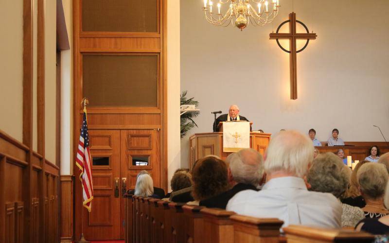 The Rev. Al Reese delivers the eulogy at the celebration of life service held for James H. Montgomery on Saturday at First Presbyterian. (MICHAEL PHILIPS/Special to the Reporter)