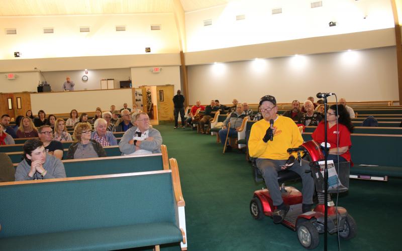 Jay Morrow, a retired Marine, asks questions during a town hall meeting on services that are no longer available at the Lake City VA Medical Center. (TONY BRITT/Lake City Reporter)