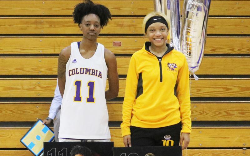 Columbia seniors Bree Dixon (11) and Taylor Ivery (10) were recognized on Senior Night prior to Thursday’s game against Buchholz. (JORDAN KROEGER/Lake City Reporter)