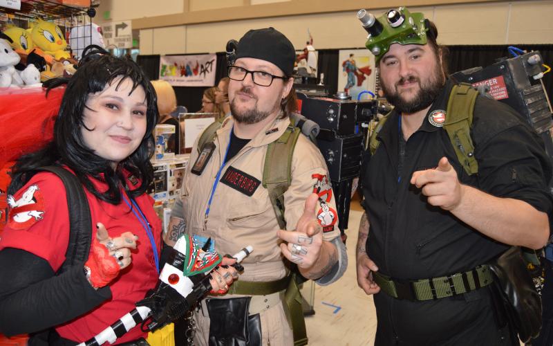 North Florida Ghostbusters Whitney Katz, Mike Vanderburg and Nick Vitale take a quick break from vanquishing the spirits of the Robert B. Harkness National Guard Armory to pose for a photo at last year’s Infinity Con. (FILE)
