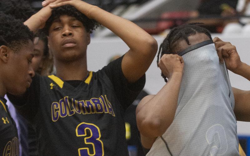 Columbia’s Charleston Ponds (3) and Darrien Jones (5), right, show their emotion after their double overtime loss to Dillard in the Class 6A semifinals at The RP Funding Center on Thursday, in Lakeland. (MICHAEL WILSON/Special to the Reporter)