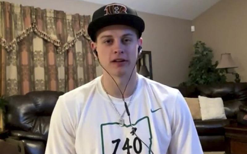  In this still image from video provided by the NFL, LSU quarterback Joe Burrow appears in The Plains, Ohio, during the NFL draft on Thursday. (NFL)