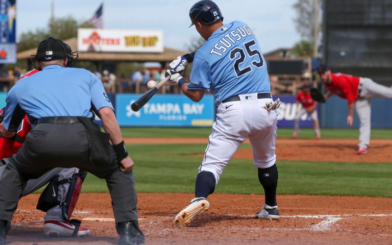 Tampa Bay Rays designated hitter Yoshi Tsutsugo connects for a solo home run in the fourth inning of a spring training game against the Boston Red Sox on Feb. 24, in Port Charlotte. (CHRIS URSO/Tampa Bay Times/TNS)