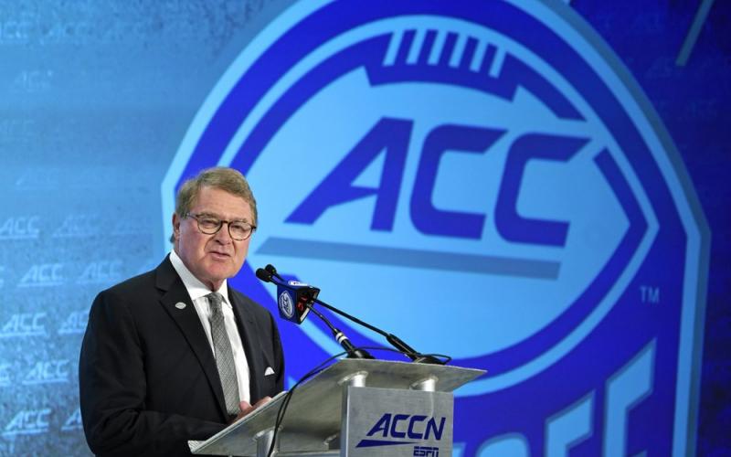 Commissioner John Swofford speaks during the Atlantic Coast Conference NCAA college football media day on  July 17, 2019, in Charlotte, N.C. There are 130 major college football teams, spread across 41 states and competing in 10 conferences, save for a handful of independents. The goal is to have all those teams start the upcoming season at the same time — whether that's around Labor Day as scheduled or later — and play the same number of games. (AP FILE PHOTO)