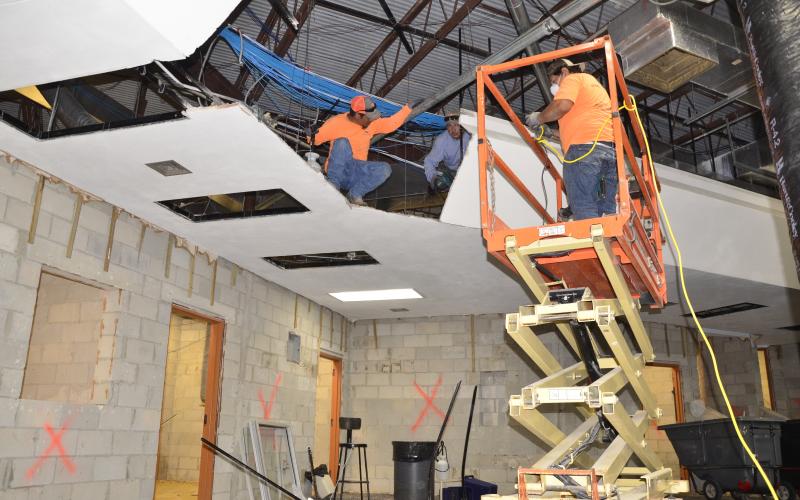 Laborers continue work on the roughly $500K CHS remodeling project, which will also include installation of new bathrooms as well as learning labs. (CARL MCKINNEY/Lake City Reporter)